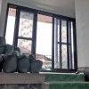 悅安花園獨特半圓弧風格異形門窗完美收尾