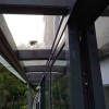 鳳鋁型材玻璃雨棚項(xiàng)目安裝過程