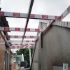 南沙濱海花園仿木紋玻璃雨棚